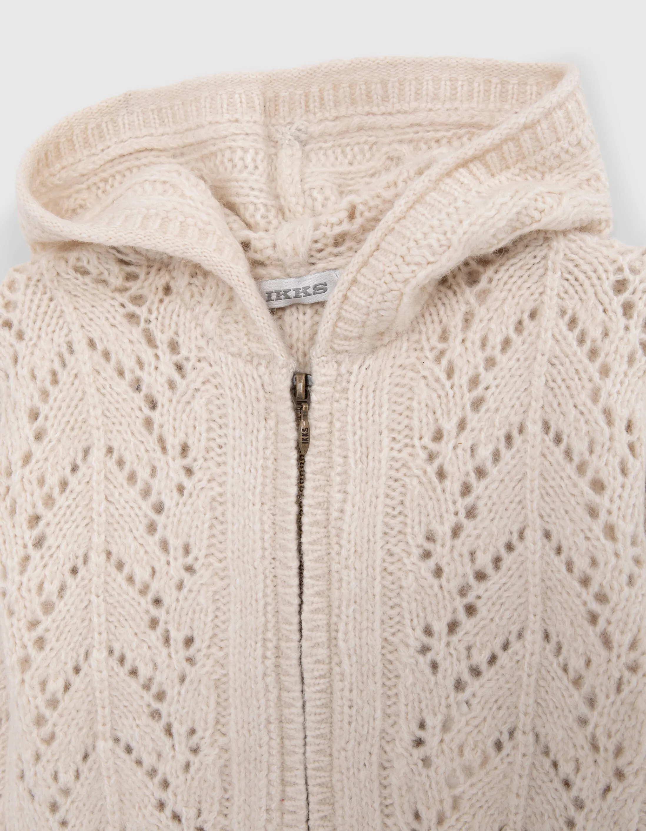 Beige knitted cardigan with zip for baby girl