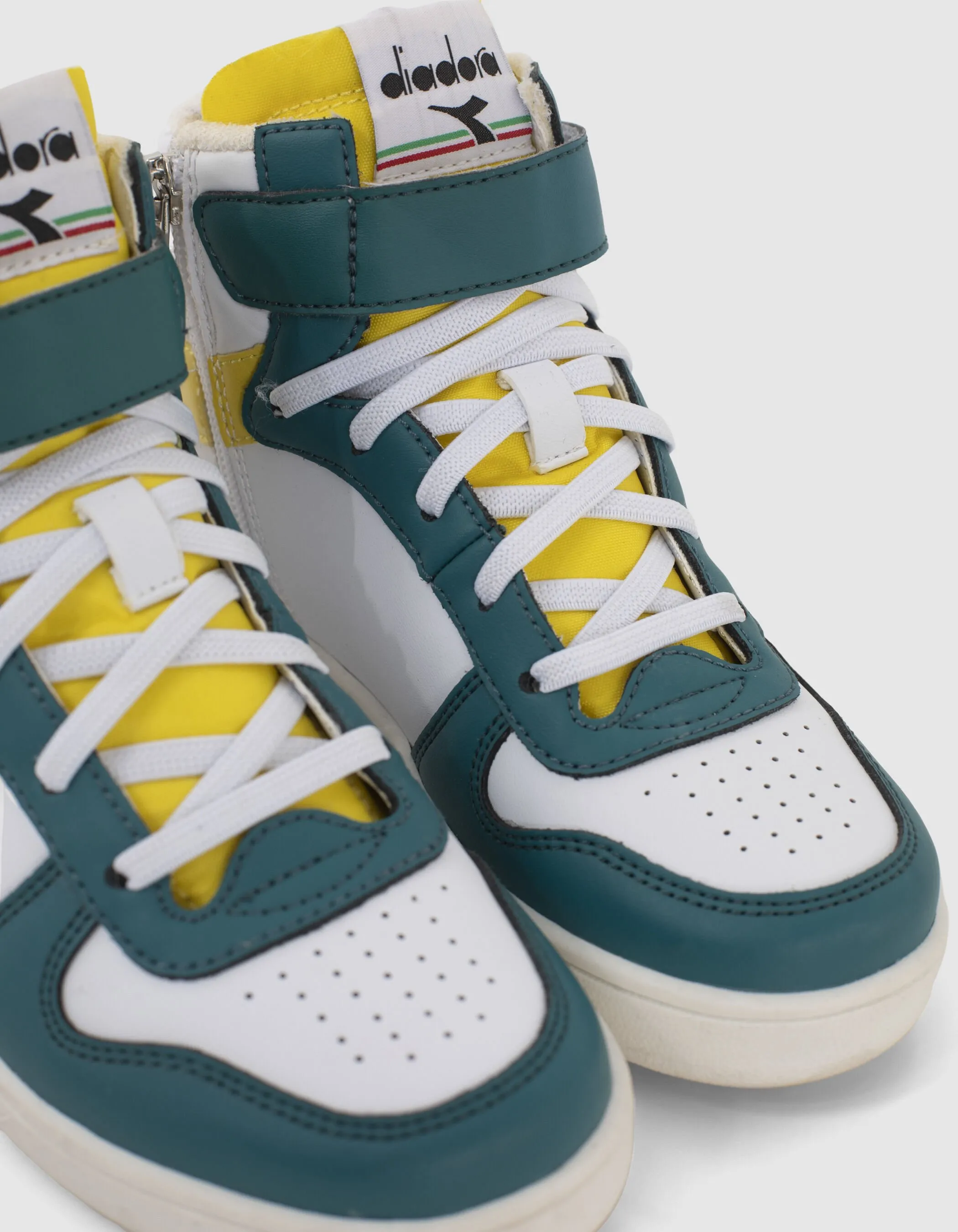 IKKS X DIADORA green, white, and yellow sneakers.