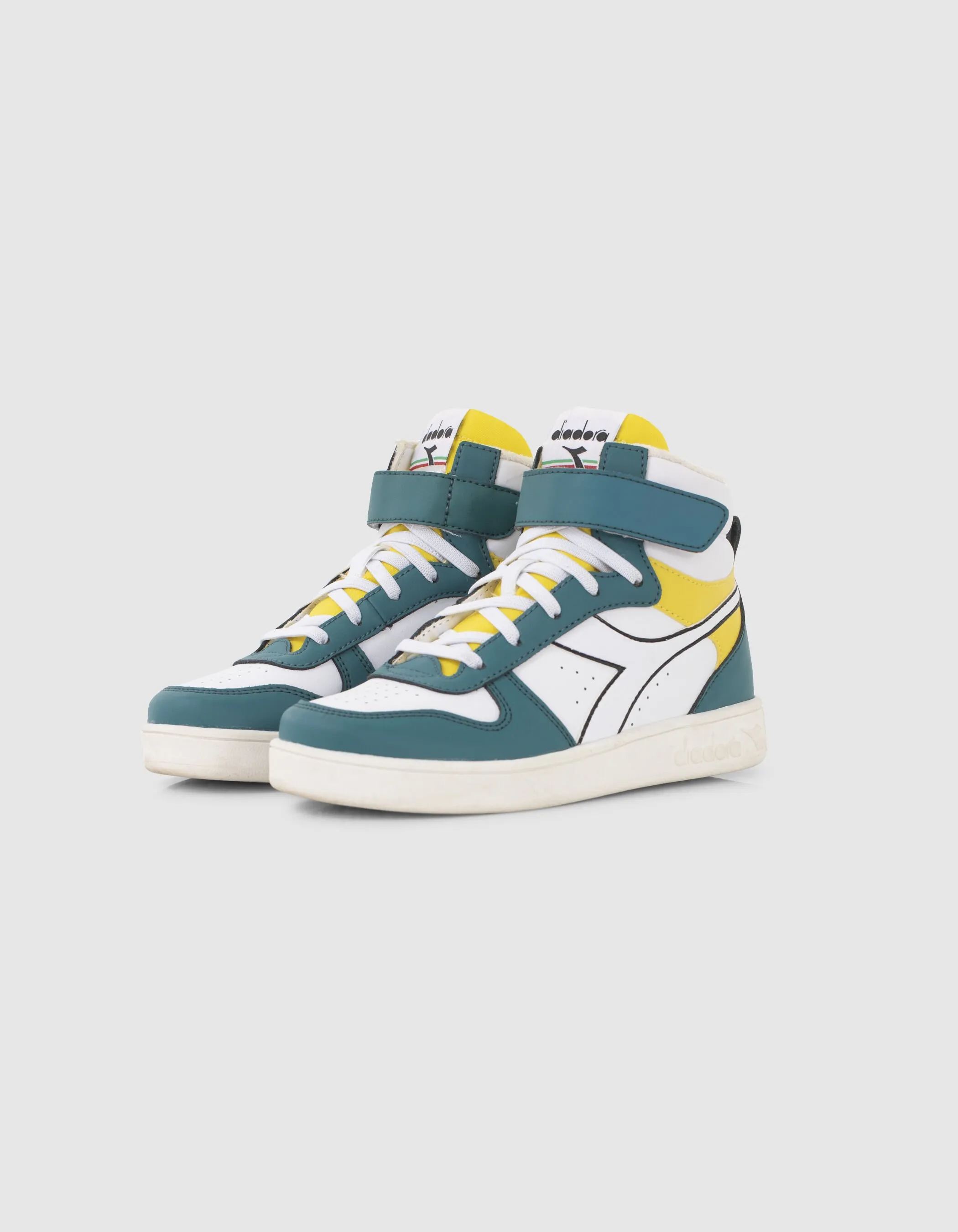 IKKS X DIADORA green, white, and yellow sneakers.