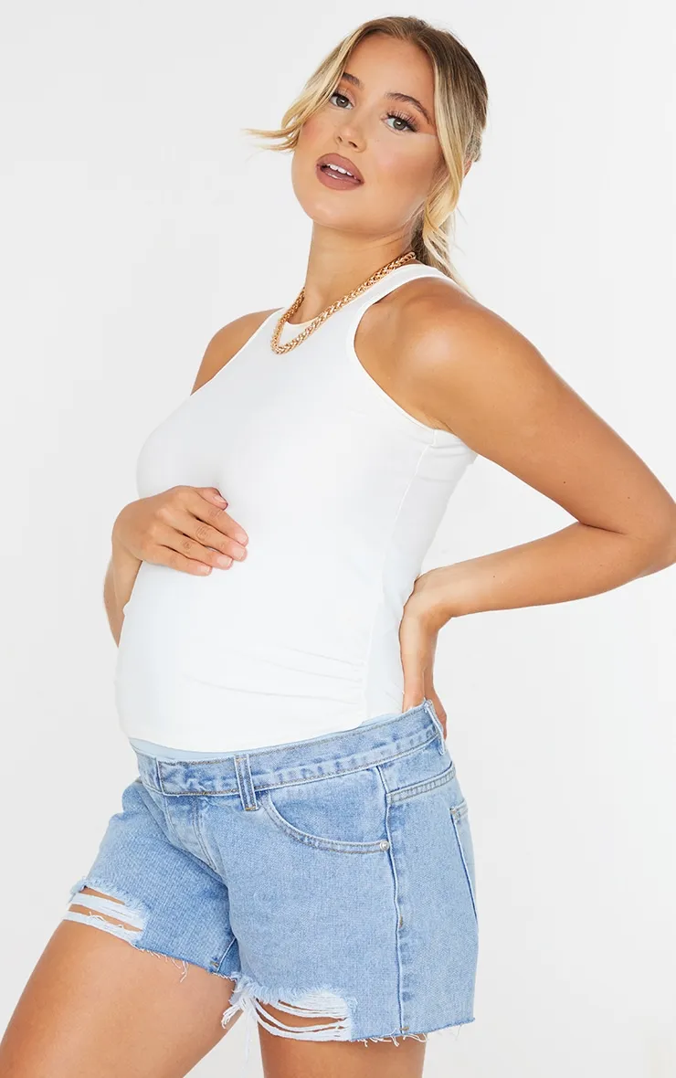 Blue Maternity Denim Shorts with Light Wash, Ripped, and Support Band.