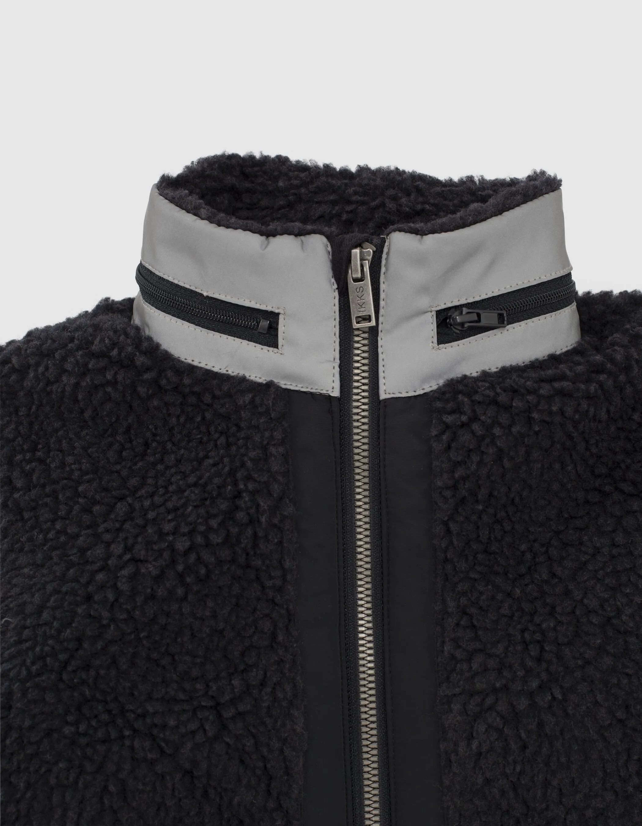 Navy blue Sherpa and nylon cardigan for boys.