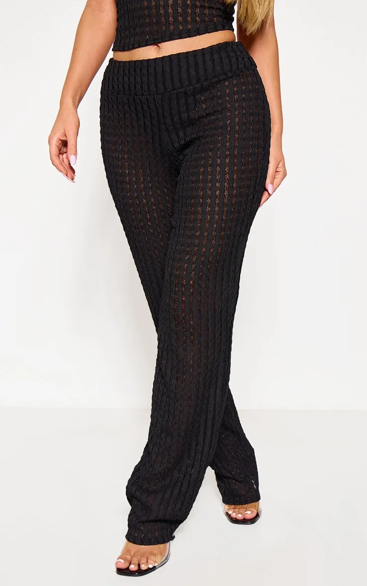 Textured flare pants with rolled cuffs