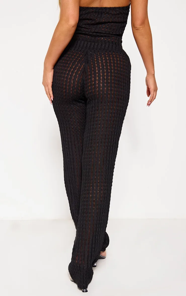 Textured flare pants with rolled cuffs